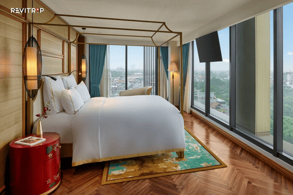 family hotels in Hanoi - Grand Mercure Hanoi glass-sided rooftop swimming pool with panoramic city views