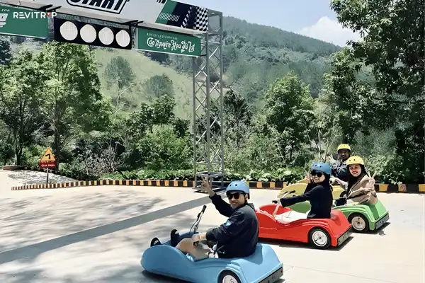 Group of travelers enjoying the Da Lat Mario Kart-style ride