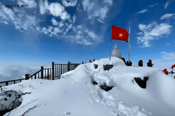 Fansipan summit covered in snow in winter with white mountain landscape"