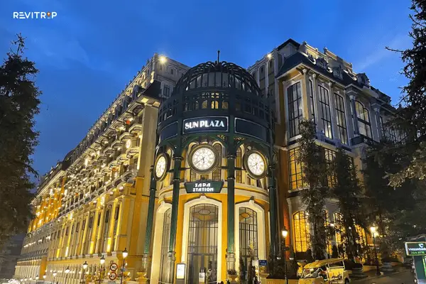 Hotel de la Coupole MGallery Sapa illuminated at night inside Sun Plaza with French Indochina architecture