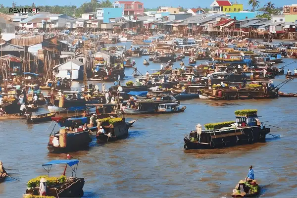 Mekong Delta Vietnam floating market at Cai Rang with trading boats at sunrise on the Hau River in Can Tho