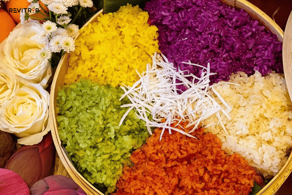 Deep-fried pillow cake banh goi Sapa street food with pork and mushroom filling served with dipping sauce