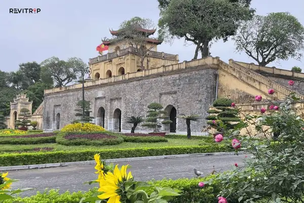Wide walkway lined with trees inside the citadel grounds