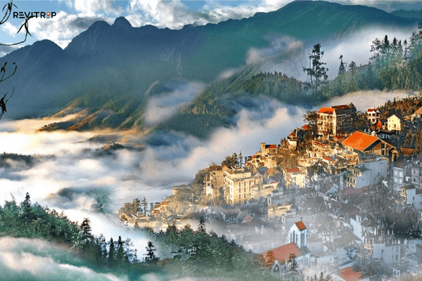 Sapa weather in March with morning mist lifting over the valley and terraced rice fields beginning to fill with water